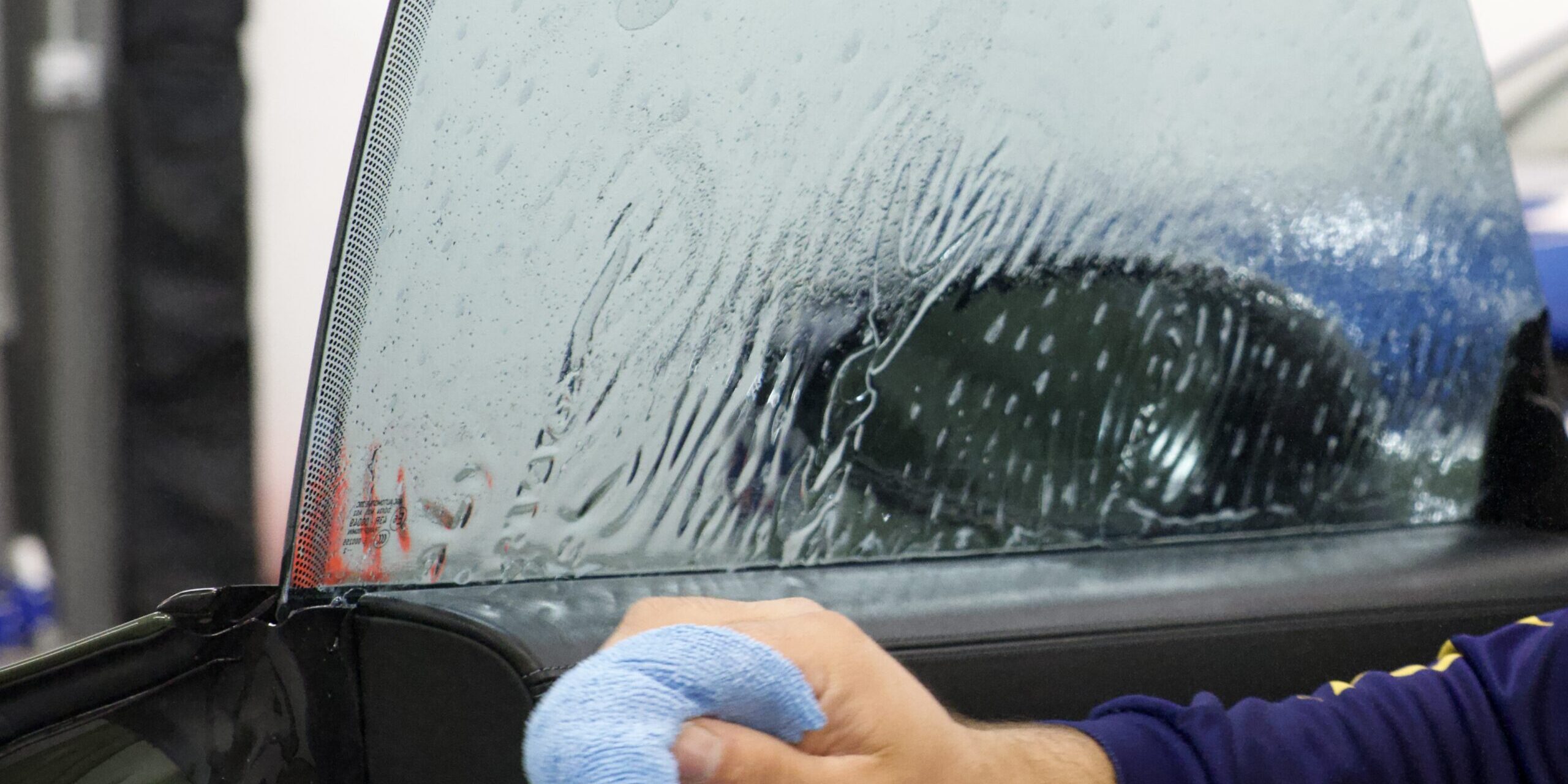 DSCF2121 Installing window tint on glass